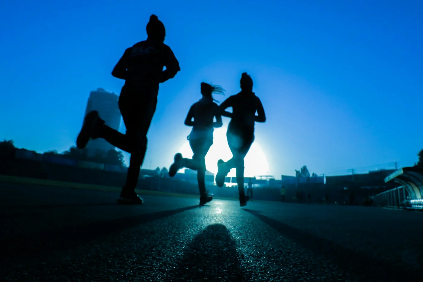 A group of runners heading out together at dawn